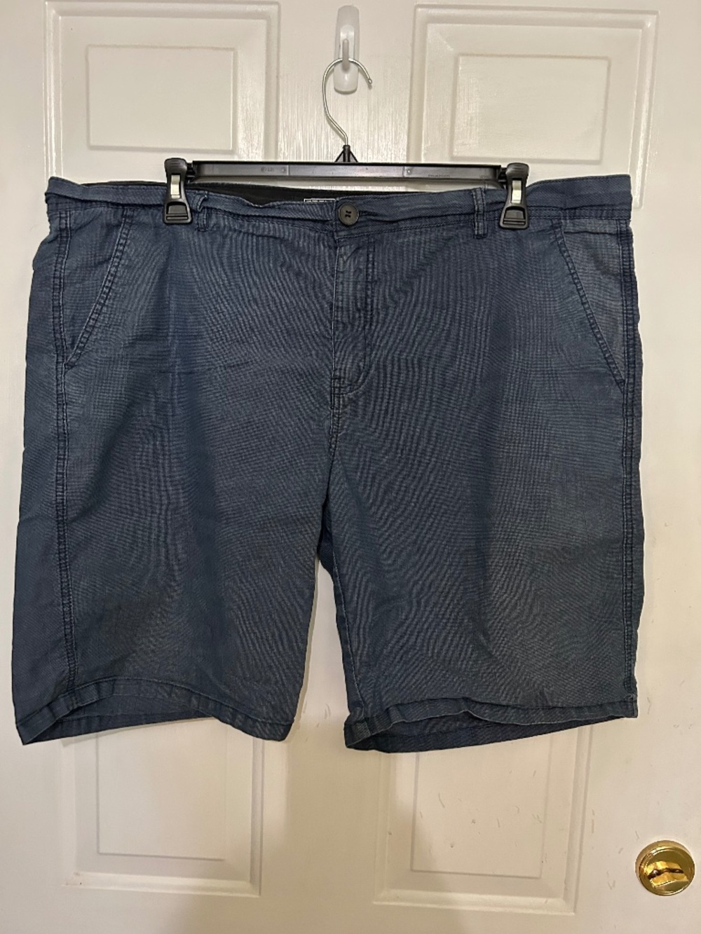 Ezekiel, 42, blue shorts
